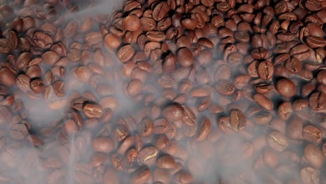 roasted coffee beans with smoke