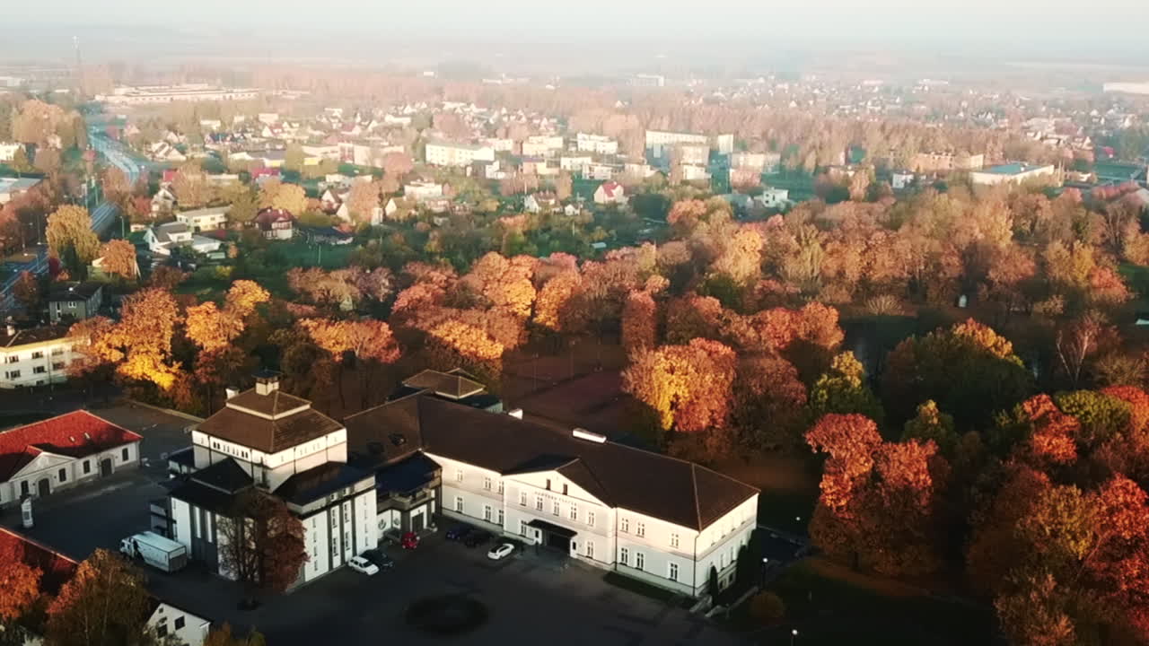 aerial shot orbits in the city and the beautiful exterior of theater in rakvere
