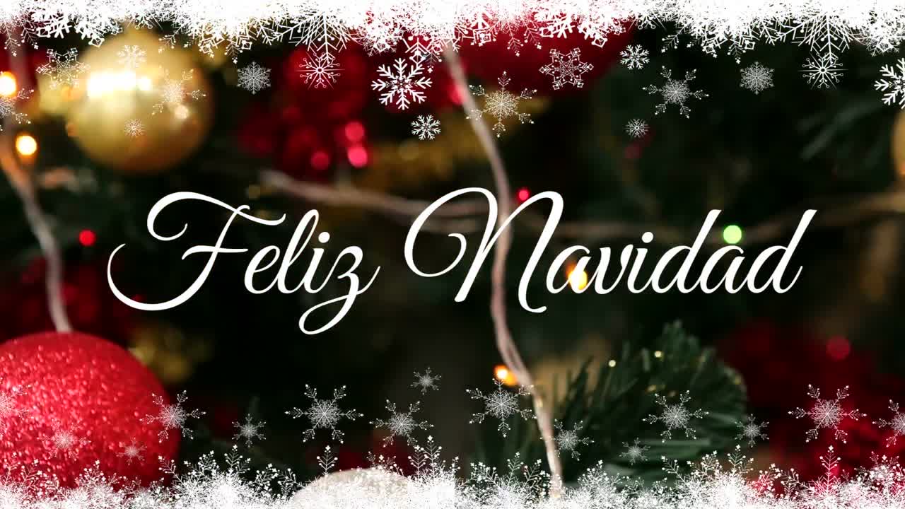 animación de feliz navidad texto sobre bolas de navidad
