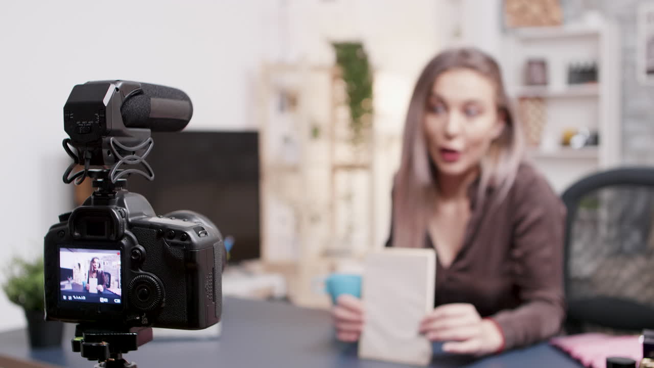 Video blogging setup with camera and vlogger