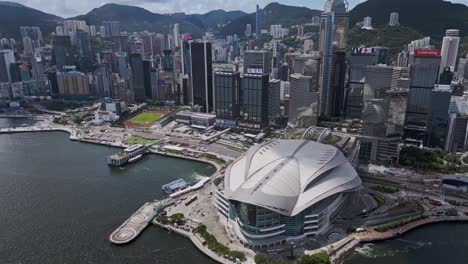 aerial of the hong kong convention and exhibition centre and city skyline, wan chai, hong kong, china