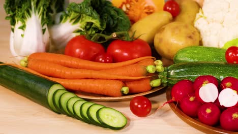 assorted vegetables arranged on a black background