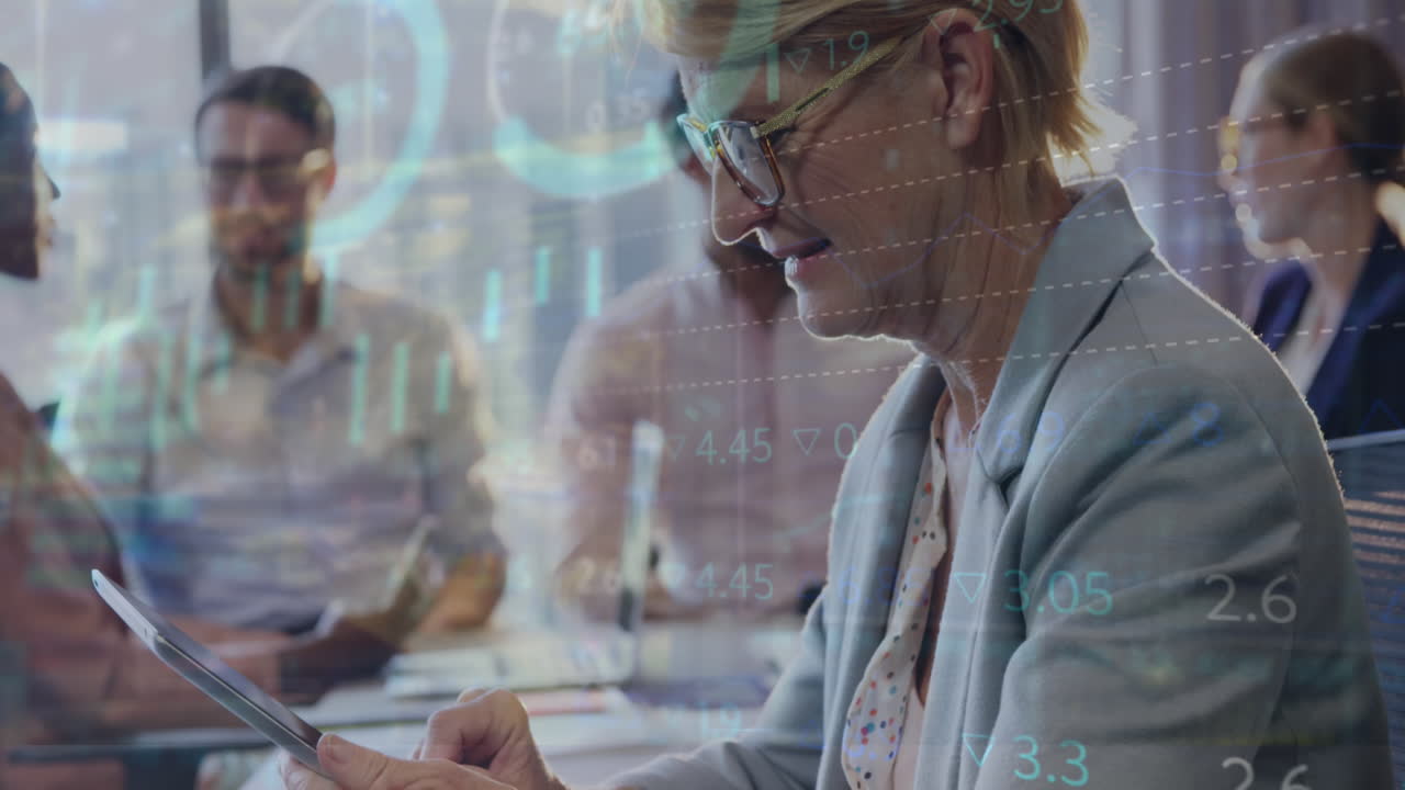 Animation of statistical data processing over caucasian senior businesswoman using tablet at office