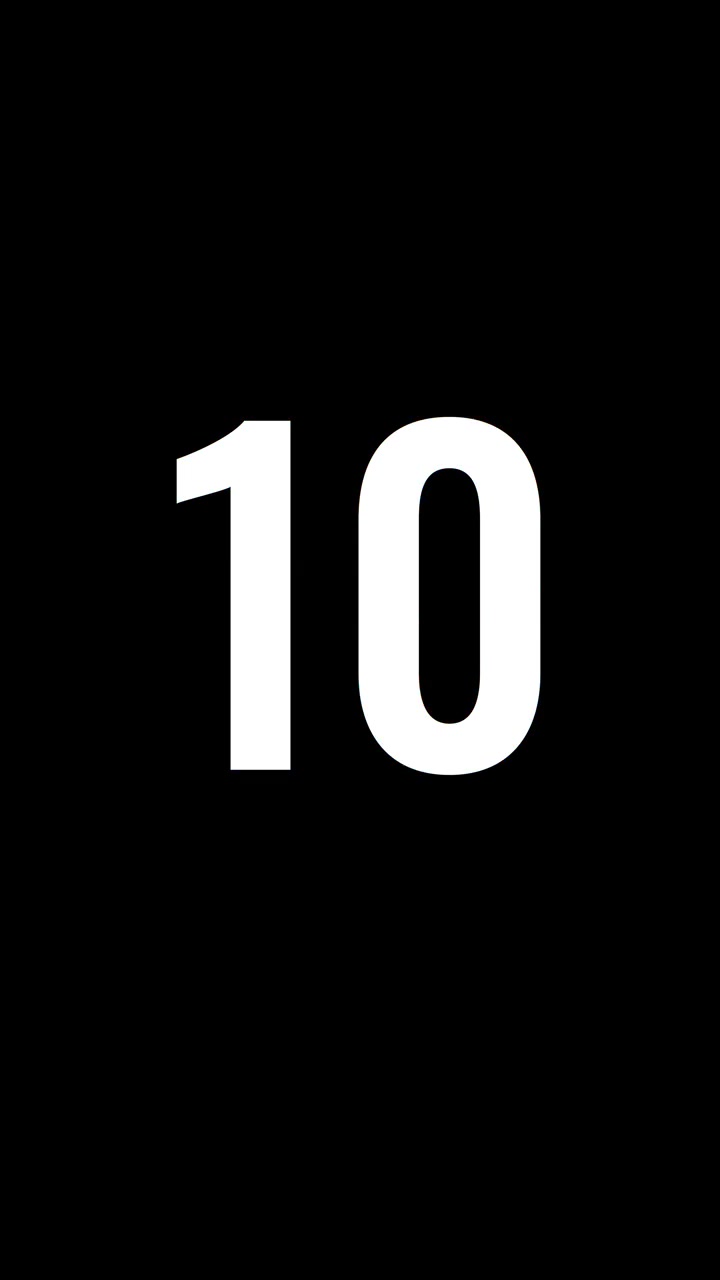 Digital Countdown Timer with Glitch Effect on Black Background