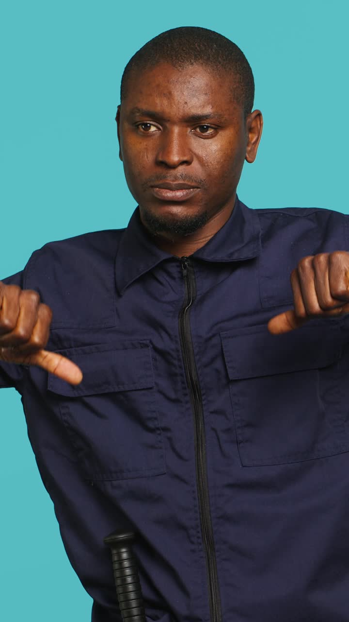 African American Man Showing Thumbs Down Gesture