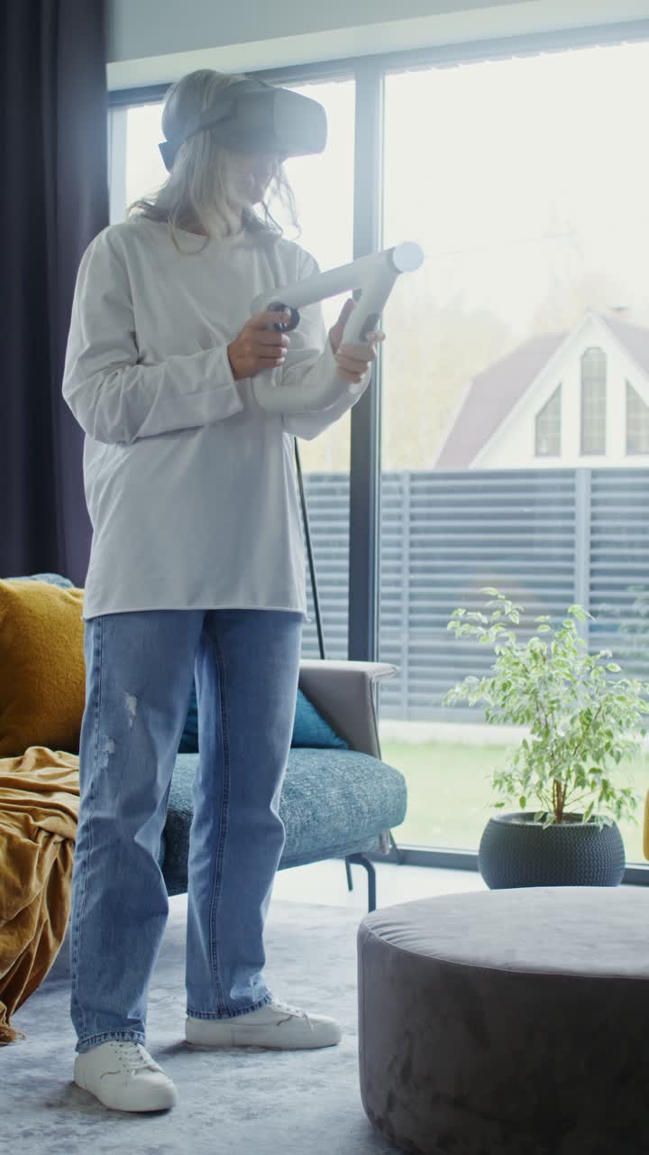 Mature woman playing VR games