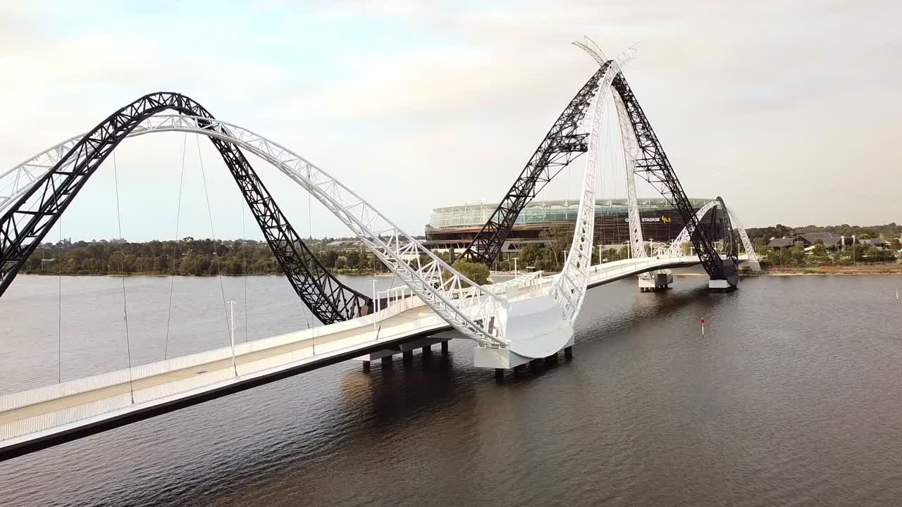 Static aerial view alongside ethe Matagarup Bridge with Optus stadium in the background