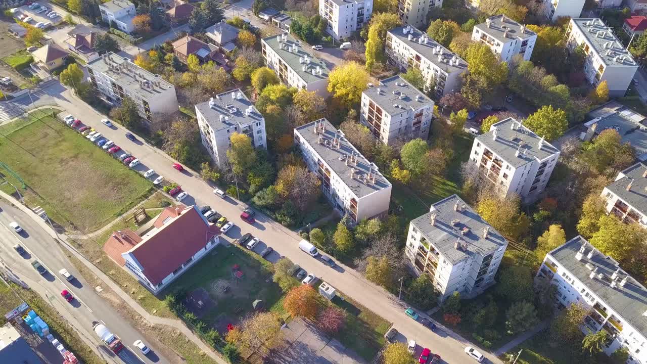 Aerial fly-by drone shot of blocks of flats in a sub-urban area near Budapest, Hungary