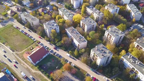 aerial fly-by drone shot of blocks of flats in a sub-urban area near budapest, hungary