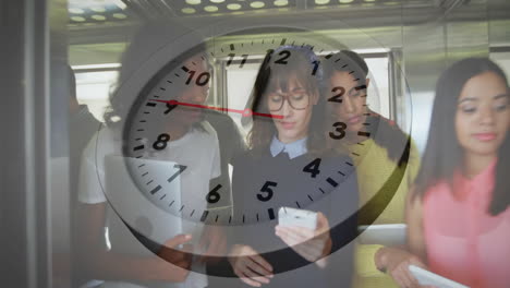 animation of clock moving over diverse colleagues discussing work in office