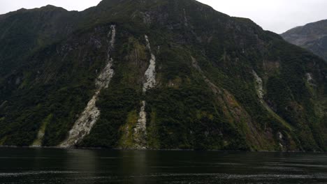 Wide-panorama-view-of-the-Milford-Sound-from-a-cruise-in-New-Zealand