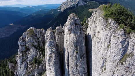 close up view of the lonely rock jagged cliffs at piatra singuratica in hasmasul mare, romania