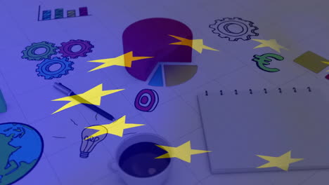 colorful star animation overlay on notebook and office supplies on desk