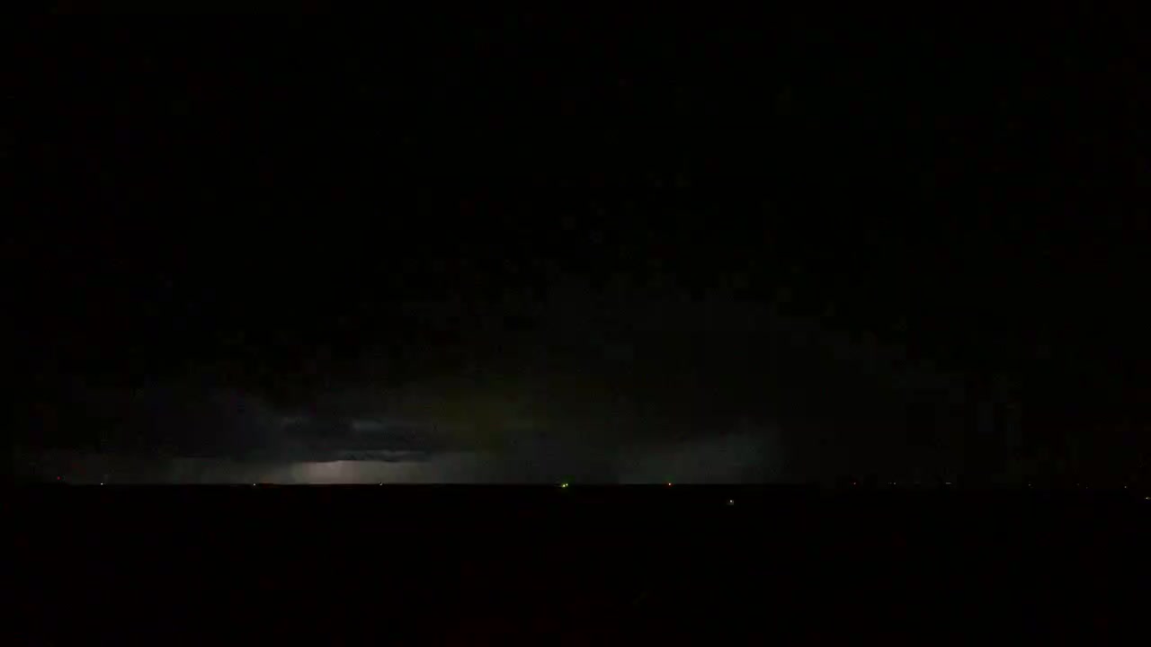 Strobe lightning flashing through a nighttime storm