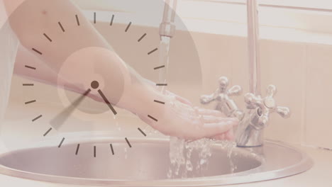 animation of a clock with fast moving hands over woman washing her hands