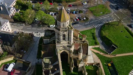 saint-étienne-le-vieux ruins, old saint stephen church, caen, normandy, france. aerial top-down backward, drone ascending
