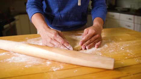 close-up-hands-kneading-and-working-with-dough-baking-a-pie-crust