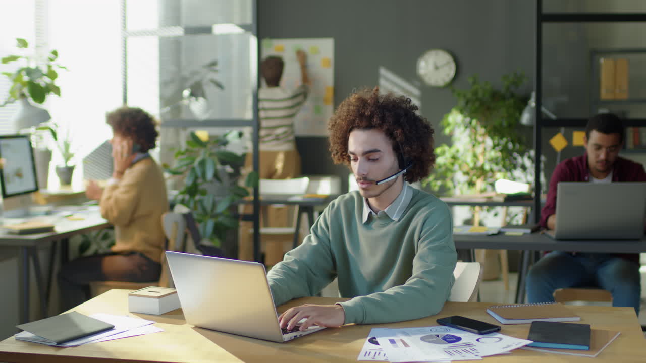 Timelapse of Call Center Operator Working in Office