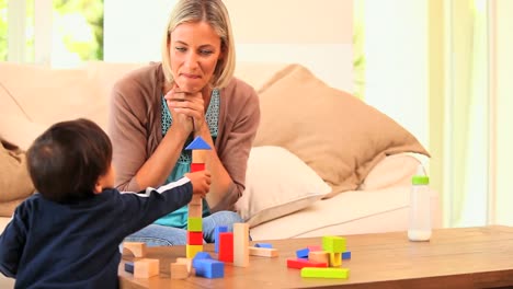 Baby-learning-to-build-a-tower-with-blocks