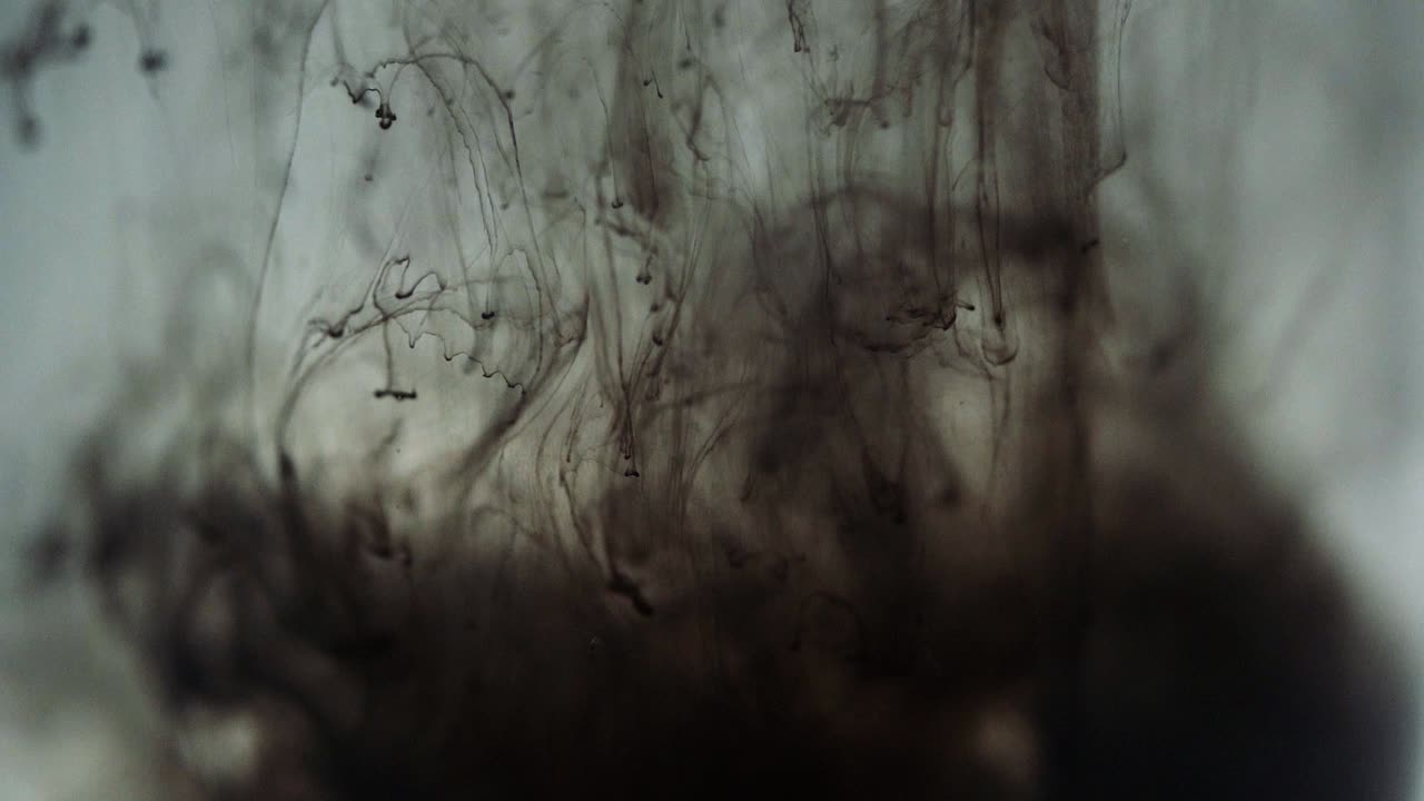 Paint floating in water looking like majestic nebulas. Stable shot with the Sony a7iii