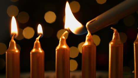 Candles burning at christmas time