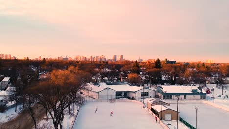 classic canadian outdoor hockey rink at sunset