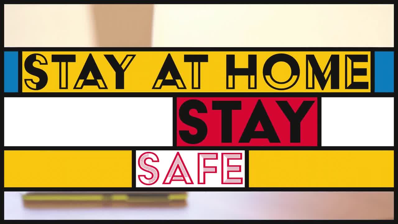 animación de texto en banderas de colores sobre un escritorio vacío