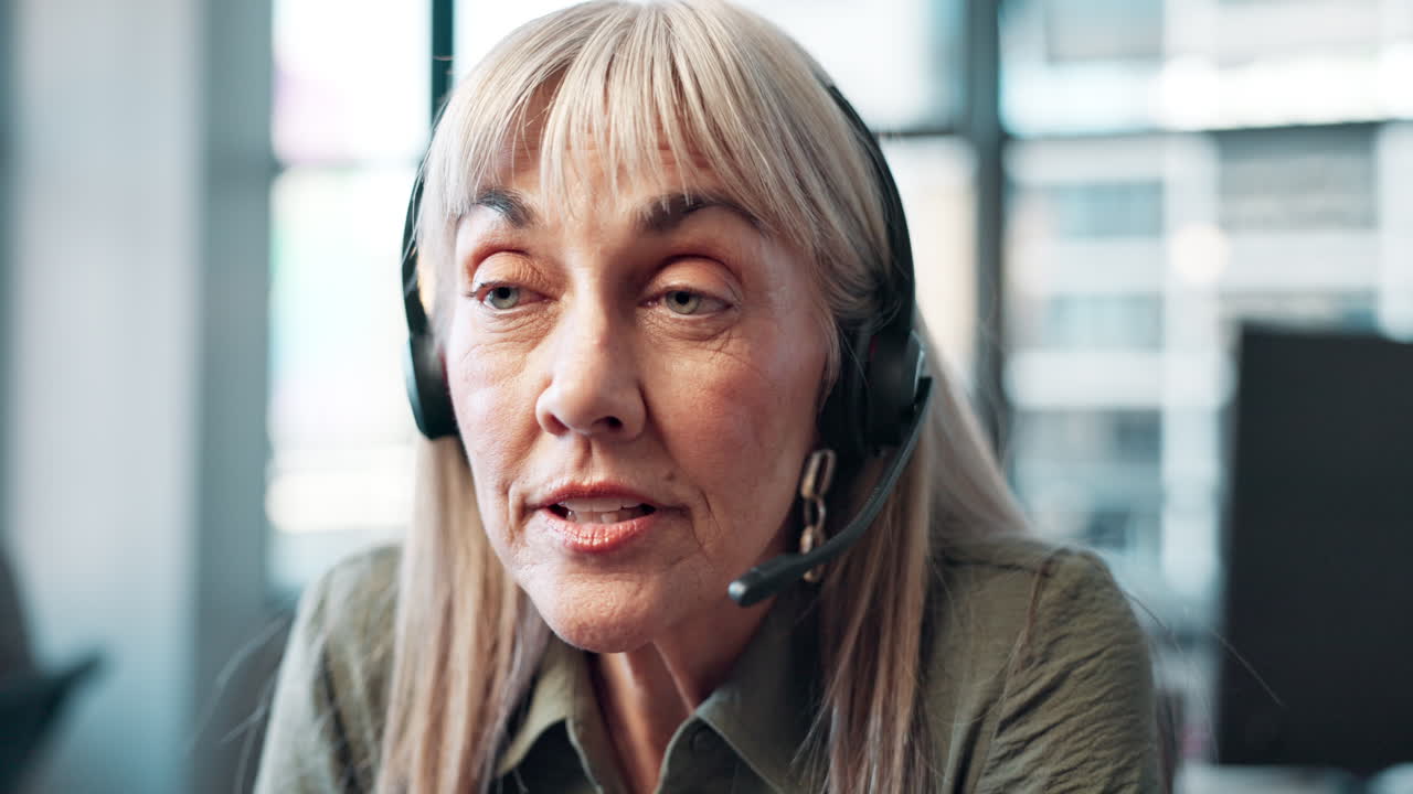 A woman is working in customer service in a call center