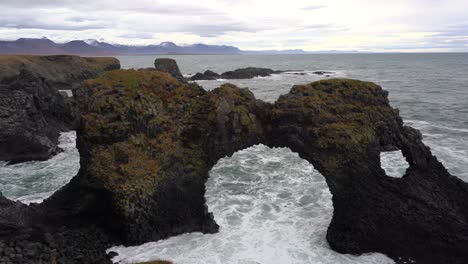 gatklettur arch shaped rock at coast of snaefellsnes peninsula in iceland