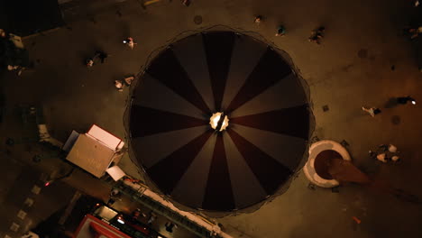 top drone angle of a carousel at night in valencia, spain