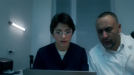 medical professionals reviewing data