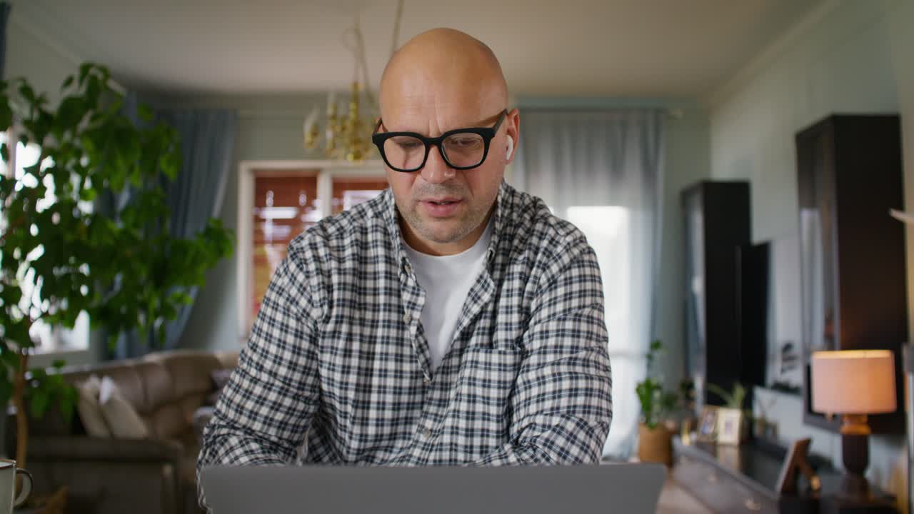 Man working from home on laptop
