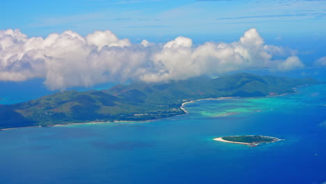 high view from airplane of mahè island in the seychelles