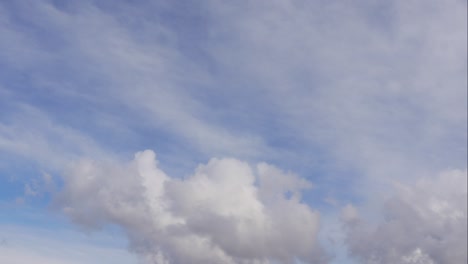 blue sky white clouds. puffy fluffy white clouds. cumulus cloud scape timelapse. summer blue sky time lapse. dramatic majestic amazing blue sky. soft white clouds form. clouds time lapse background