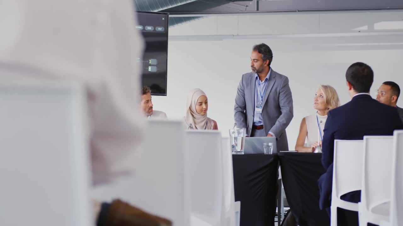 Businessman speaking at a conference