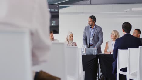 businessman speaking at a conference
