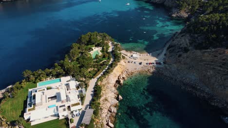aerial view over cala benirras in ibiza, spain