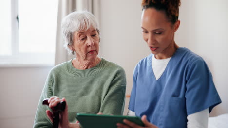 nurse consults with coughing elderly woman
