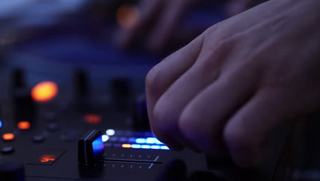 dj playing dance music - close up