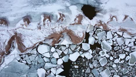 4k video of frozen mountains and icebergs