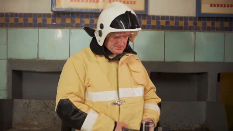 firefighter adjusting safety gear