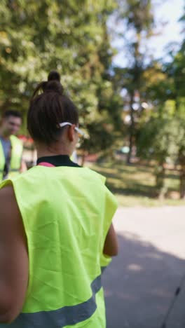 volunteers cleaning a park