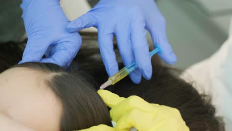 plasma therapy of the scalp. hair mesotherapy procedure in the modern cosmetology clinic