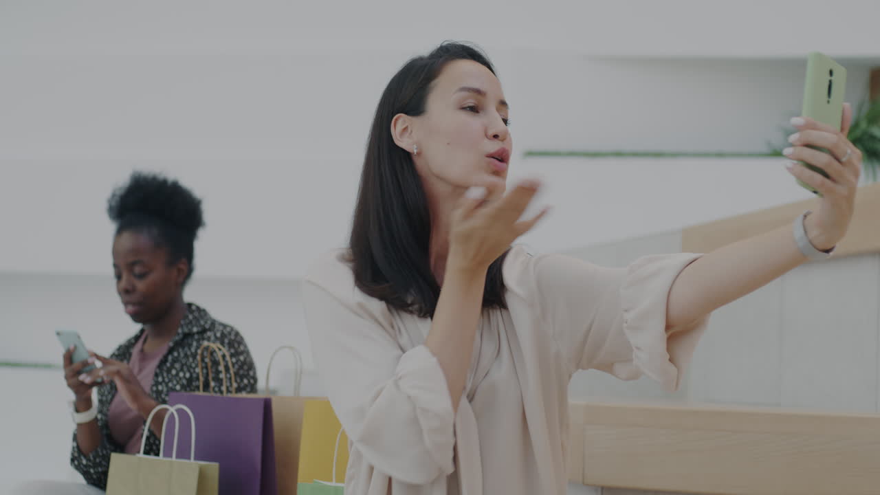 Woman Taking Selfie in Shopping Mall