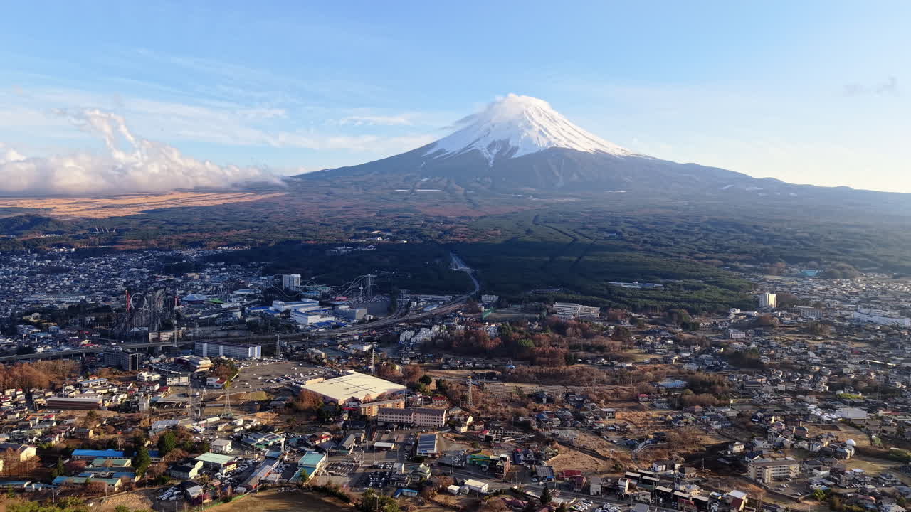 Aerial drone view of the Fujikawaguchiko town, Japan at the foothills of Mount Fuji in daylight