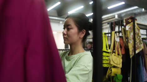 side view of asian woman in a store