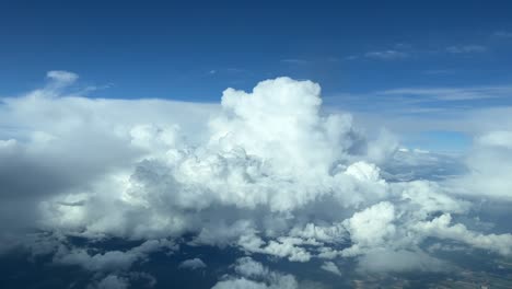 Aerial-view-from-a-jet-cockpit-of-a-huge-cumuloninbus