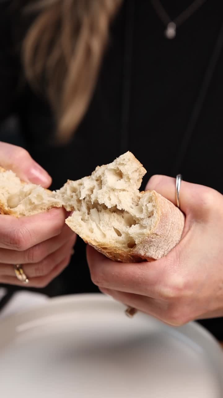 Tearing a Loaf of Bread