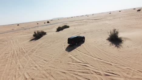 Slow-Motion-FPV-Drone-Clip-of-Off-Road-Car-in-the-desert