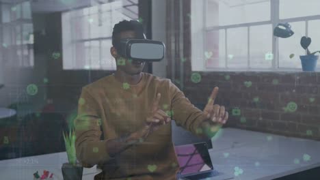 un hombre de negocios afroamericano sentado en un escritorio y usando un auricular vr.